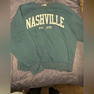 Blue Altar’d State crewneck, size medium.